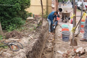 Digging under historic brick wall